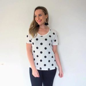 Hayley Cooper models a polka dot shirt.