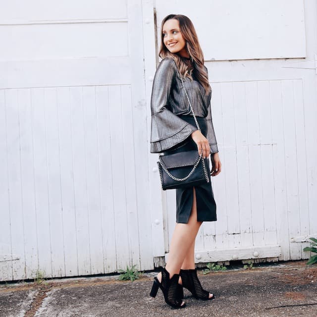 Hayley Cooper models silver top, skirt and bag.