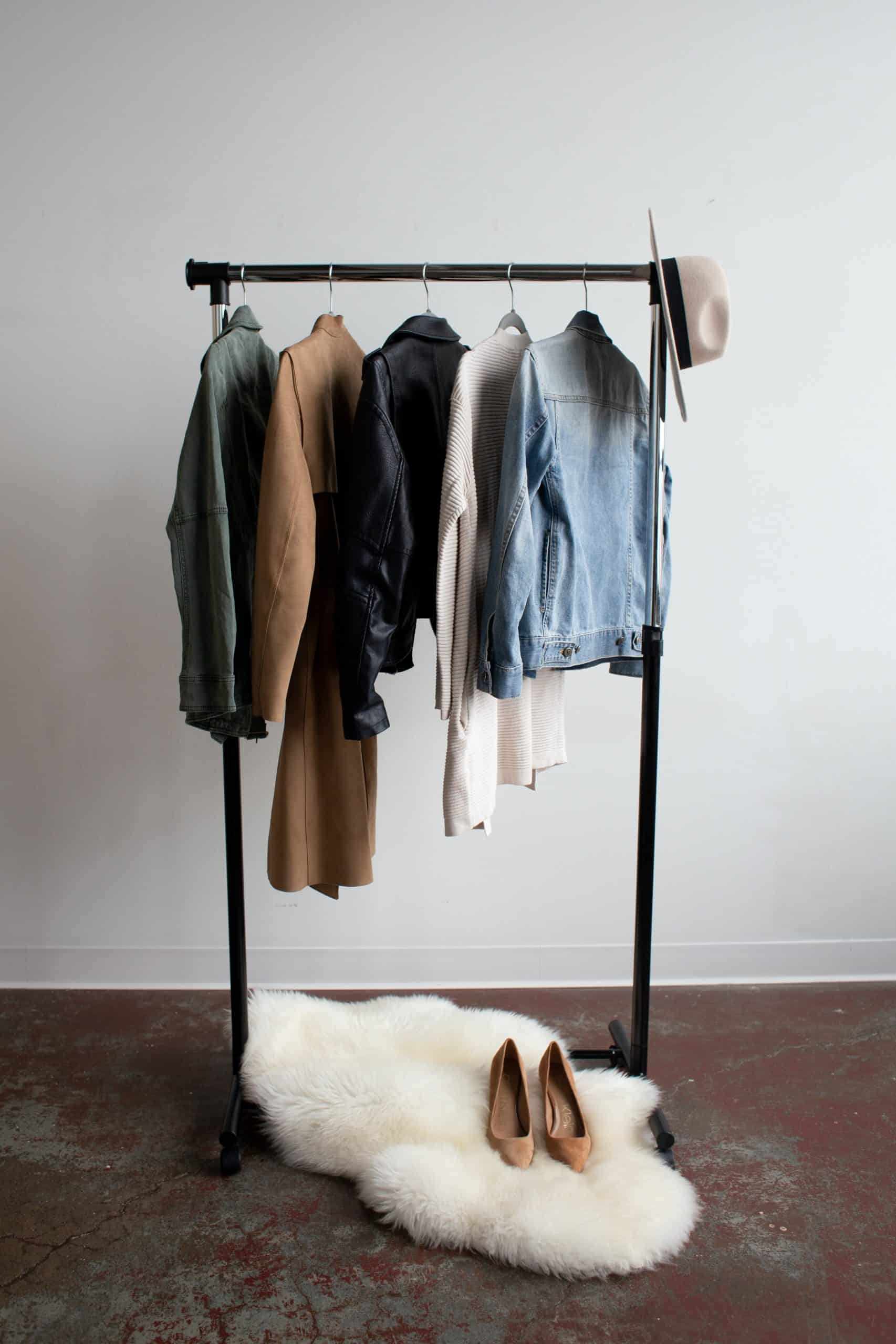A clothing rack holds Hayley Cooper styling pieces, a hat and a pair of shoes.