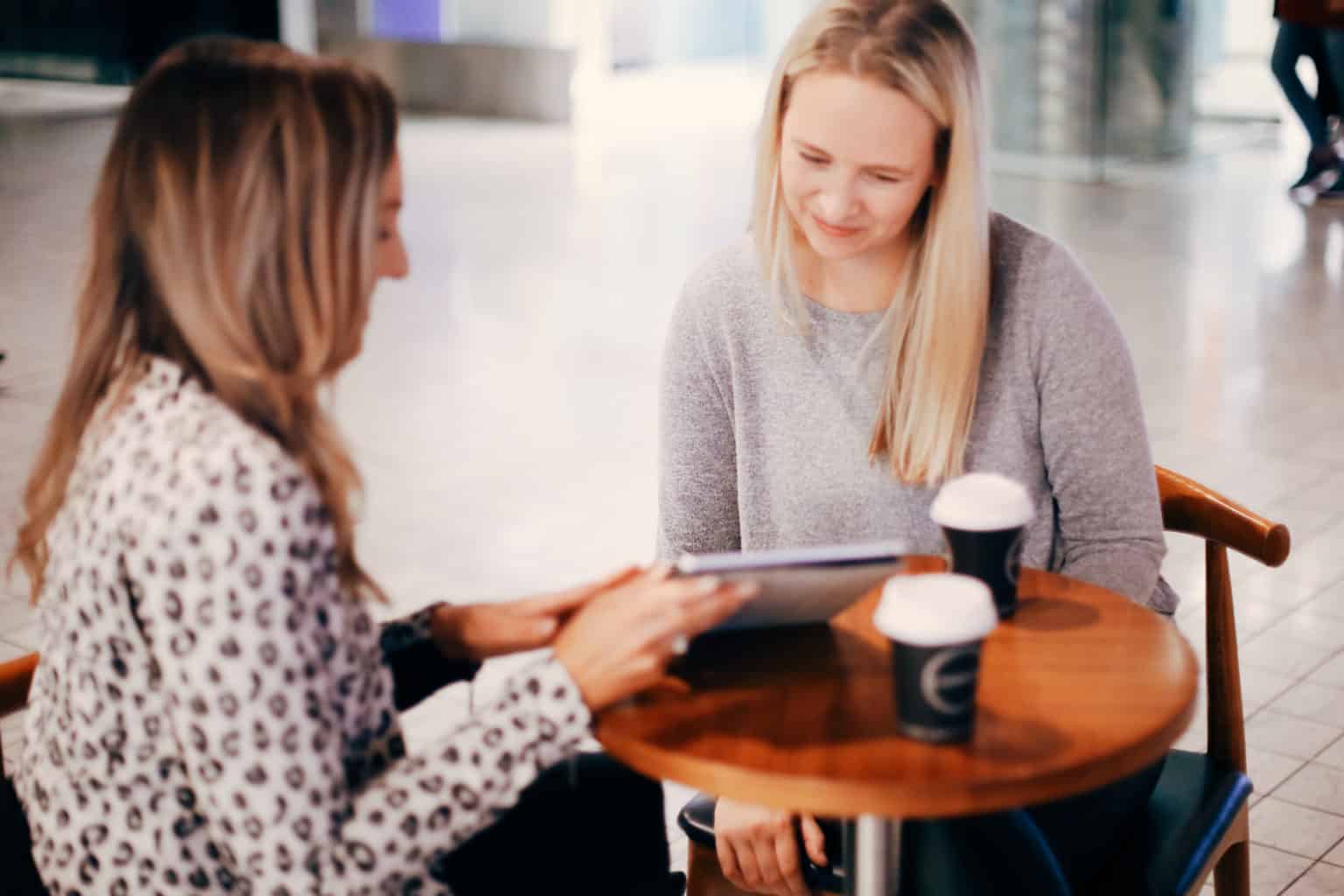 Hayley Cooper has a coffee meeting with a client.